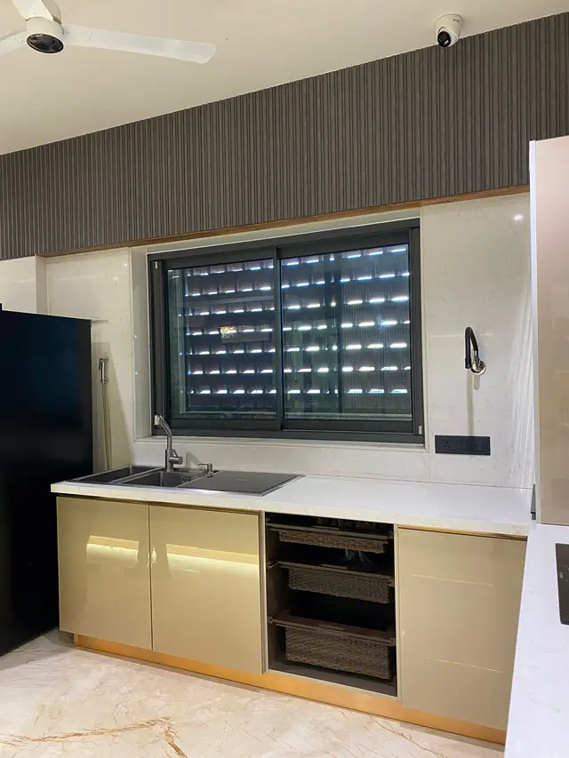 Beige kitchen with base storage and display racks