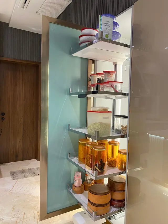 Corner carousel unit with glass shutter for masala storage